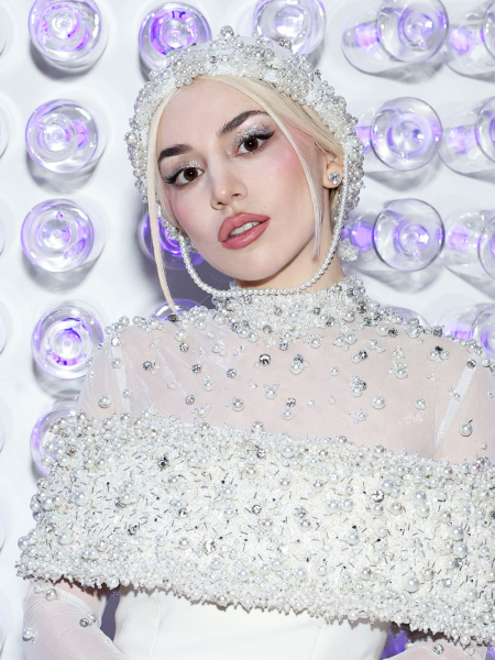 Ava Max in a white dress with silver glitter disco eyeshadow '70s makeup trend