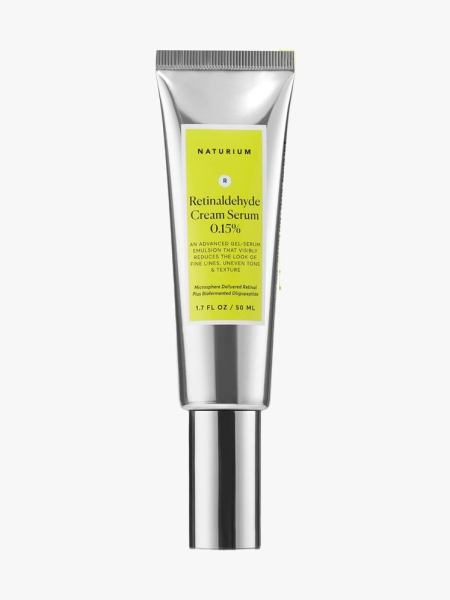 Naturium Retinaldehyde Cream Serum 0.15% in branded tube component on a light gray background